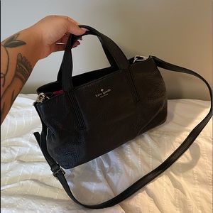 Kate Spade purse. Black outside and hot pink inside.